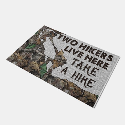 Twee wandelaars hier Mat, neem een heek. Deurmat (Schuin)
