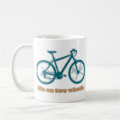 twee wielen . koffiemok (Links)