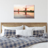 Twee windmolens met reflectie bij zonsondergang canvas afdruk (Insitu (Slaapkamer))