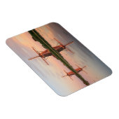 Twee windmolens met reflectie bij zonsondergang magneet (Rechterzijde)