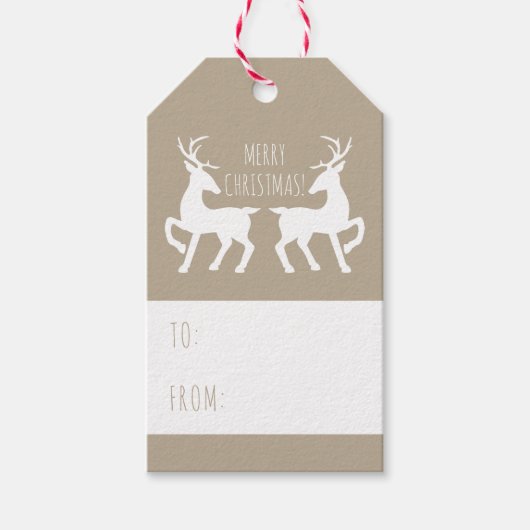 Twee witte feestjes op beige kleurenkerstmis cadeaulabel (Voorkant)