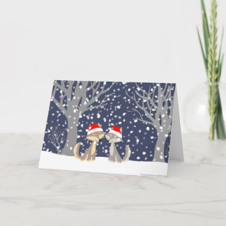 Twee wolven in het wenskaart van de winterKerstmis Feestdagen Kaart