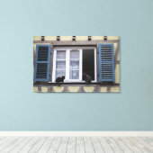 Twee zwarte katten bij het raam canvas afdruk (Insitu (Houten vloer))