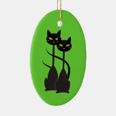 Twee zwarte katten met lange hals op groen keramisch ornament (Rechts)