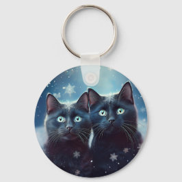 Twee zwarte katten worden besneeuwd sleutelhanger