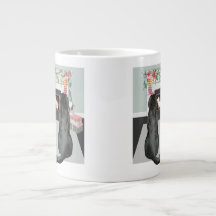 Twee zwarte labradors voor honden met kerstaffelka