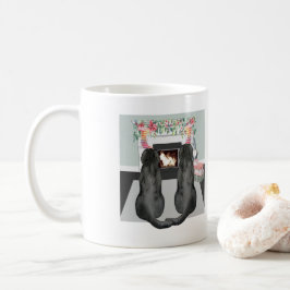 Twee zwarte labradors voor honden met kerstaffelka koffiemok