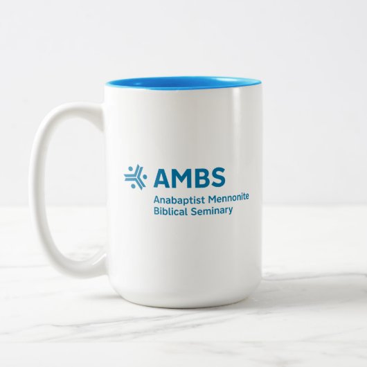 Tweekleurige mok met AMBS-logo (Links)