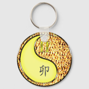 Tweelingen en vuurkonijn sleutelhanger