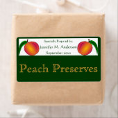 Tweelingperziken ingelijst in groen zelfgemaakt et etiket (Insitu)