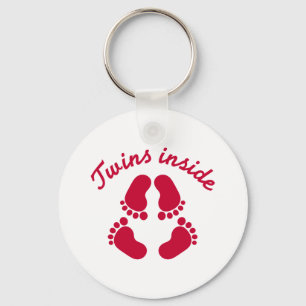 Twijndraden in baby sleutelhanger