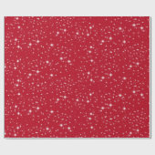 Twinkelende kerststerren op rood cadeaupapier (Vlak)