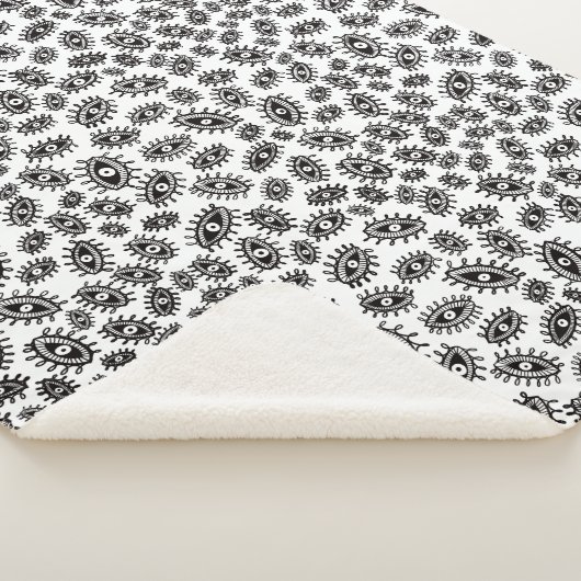 Twirly ogen wit sherpa deken (3/4)