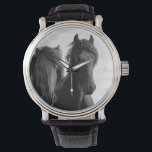 Two Friesian stallions. Horloge<br><div class="desc">Two Friesian stallions. Headshot of Friesian stallion. These horses are maybe one of the most graceful and impressive breeds. Impressive because of their size and strong looks. Black and White image. Image by Jan Brons</div>