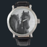 Two Friesian stallions. Horloge<br><div class="desc">Two Friesian stallions. Headshot of Friesian stallion. These horses are maybe one of the most graceful and impressive breeds. Impressive because of their size and strong looks. Black and White image. Image by Jan Brons</div>
