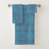 Two images of blue towels with a geometric diamond bad handdoek (Insitu)