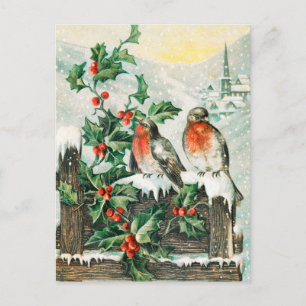 Two robins on a fence in the snow briefkaart