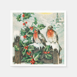 Two robins on a fence in the snow servet