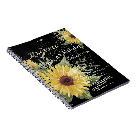  typografie en zonnebloemen op zwart notitieboek (Rechterzijde)
