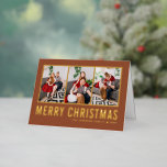 Typografie Foto Collage Terracotta Kerstmis Folie Feestdagenkaart<br><div class="desc">Vrolijk kerstfeest! Stuur dit seizoen uw wensen met deze aanpasbare kerstfotocollage. Het kenmerkt eenvoudige typografie op een terracotta achtergrond. Personaliseer door drie foto's,  namen,  jaar en andere details toe te voegen. Deze zwarte kerstkaart met gouden folie is verkrijgbaar in andere kleuren en in andere kartonnen dozen.</div>