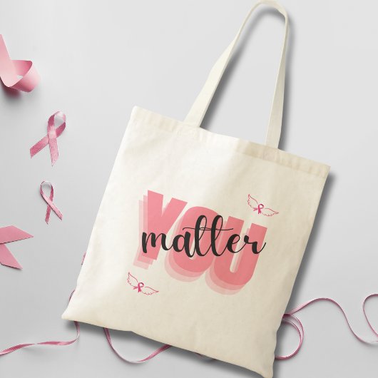 U bent een gematigde kankerbestrijder en een roze  tote bag