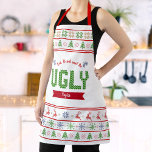 Ugandee kerstSweater Nordic Red Green Knit Name Schort<br><div class="desc">Eet, drink en lelijk zijn. Hier is een wonderlijke manier die aan het plezier van uw vakantiebakken toevoegt. Voeg extra glans toe aan je vakantie culinaire avonturen wanneer je dit unieke, grillige, moderne, aangepaste kerstfeest schort draag. Een schattig, noords breid fair isle-patroon van witte bomen, rendieren, ornamenten, samen met een...</div>