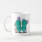 Uit de klok Rubber klompen en bloemen Koffiemok (Links)