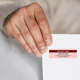 Uitgelichte merk op lichtrode retouradres etiket