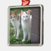 Uitspelen van katten metalen ornament (Links)