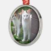 Uitspelen van katten metalen ornament (Links)