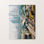 Uitzicht van de metrolijn en de wolkenkrabbers in legpuzzel (Verticaal)