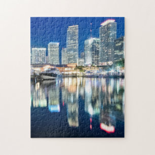 Uitzicht van de skyline met reflectie in water, Mi Legpuzzel
