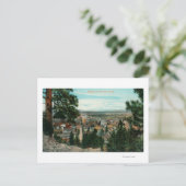 Uitzicht van de stad door de bomen briefkaart (Staand voorkant)