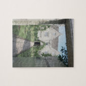 Uitzicht van de voorzijde van het huis (foto) legpuzzel (Horizontaal)
