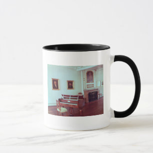 Uitzicht van een kamer met een grote piano mok