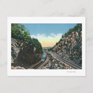 Uitzicht van een trein naast de weg briefkaart