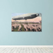 Uitzicht van een Zeppelin-blimp over graasschapen Canvas Afdruk (Insitu (Houten vloer))