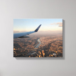 uitzicht van het waterlichaam tussen gebouwen vanu canvas afdruk