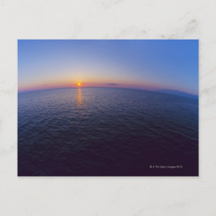 Uitzicht van horizon boven zee bij zonsopgang briefkaart