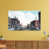Uitzicht van Main Street and Horse Carriages Canvas Afdruk (Insitu (Woonkamer))