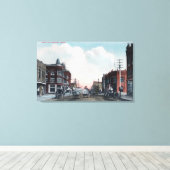 Uitzicht van Main Street and Horse Carriages Canvas Afdruk (Insitu (Houten vloer))