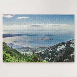Uitzicht van zee uit bergen legpuzzel