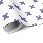 Ultra-violetkruisstiften op wit cadeaupapier (Rol Hoek)