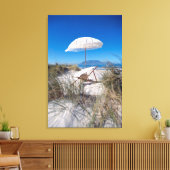 Umbrella en stoel op strand canvas afdruk (Insitu (Woonkamer))