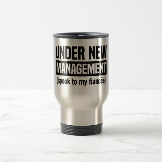 Under New Management Mug Reisbeker (Center)