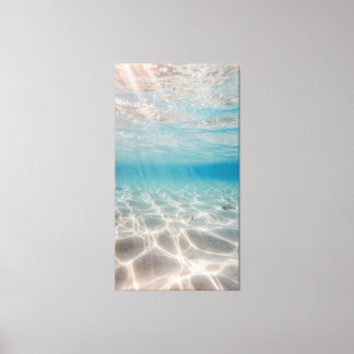 Underwater sunlight shimmers on the sandy seabed canvas afdruk