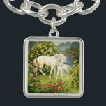 Unicorn en slachtdieren Armbanden<br><div class="desc">Een mooie en gevoelige  scène van een moeder eenhoorn met haar veulen,  in een weide bloemen,  maakt dit de perfecte armband om aan Moederdag,  aan de nieuwe moeder of aan die eenhoorn liefhebber te geven! Handgemaakt in de VS en echt uniek!</div>