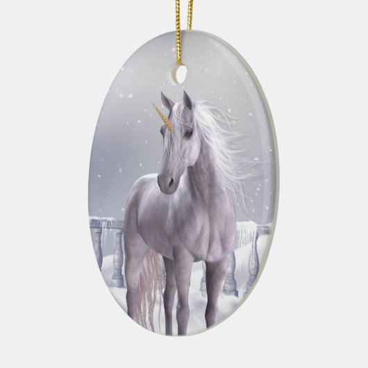 Unicorn in de sneeuw keramisch ornament (Links)