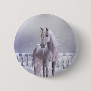 Unicorn in de sneeuw ronde button 5,7 cm