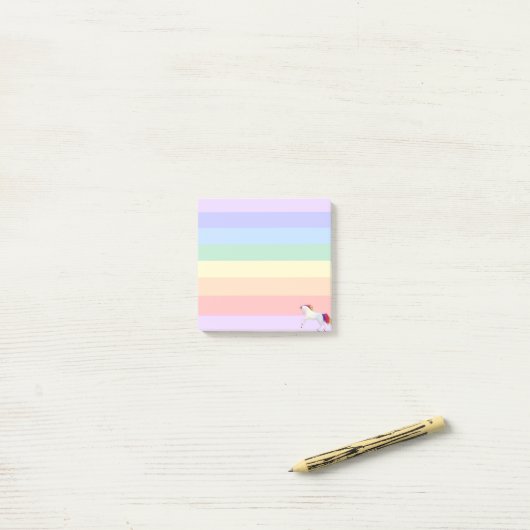 Unicorn op pasteelregenboogstrips post-it® notes (Op bureau)